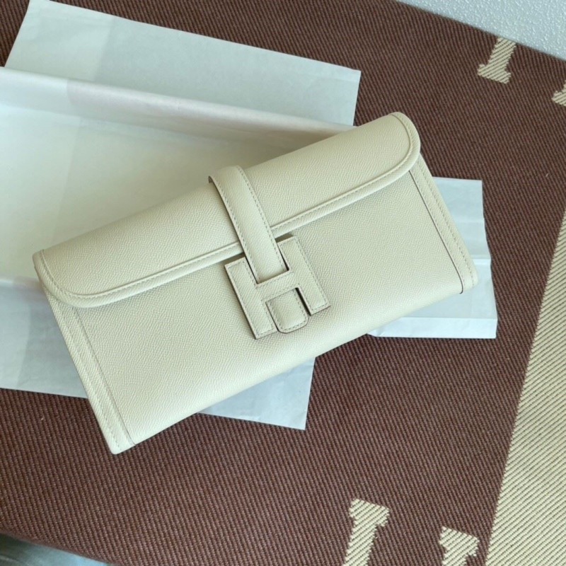 H**mes clutch bags